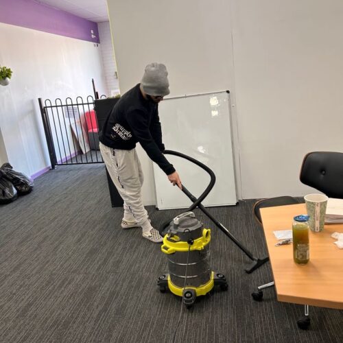 Connor vacuuming